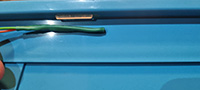 Reed switch on side of cage