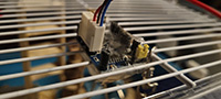 Motion sensor attached to cage